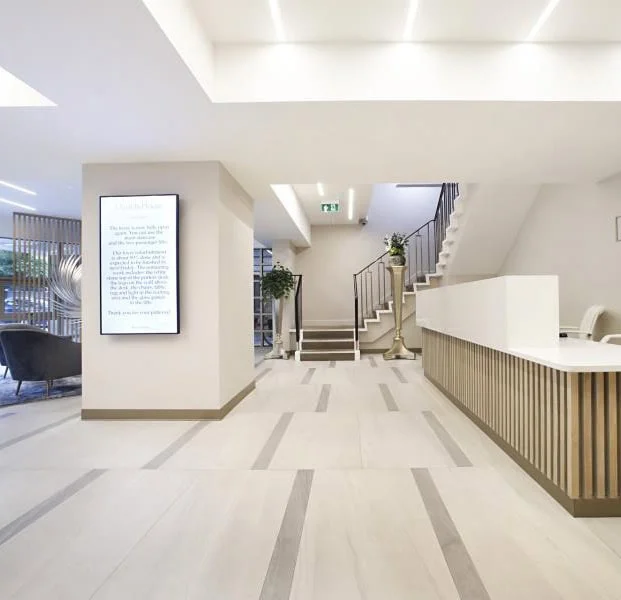 foyer durrels house glooring, lighting and reception desk